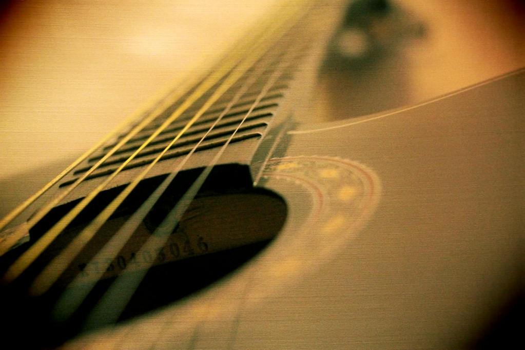 close up photo of black guitar