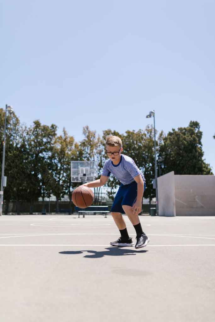 kid playing basketball
